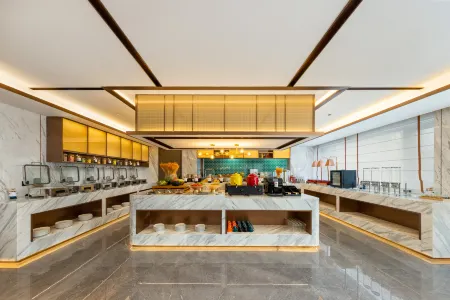 Merlinhod Hotel (Guangzhou Panyu Zhanglong Wanbo Center) Отели рядом с достопримечательностью «Guangzhou Vocational College of Technology & Business»