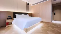 Squirrel Smart Hotel (Foshan Qiandeng Hunan Gui Road Subway Station Branch) Hotel di Distrik Nanhai