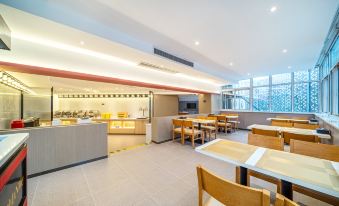 Guzhen Romantic Journey Hotel (Touzhi Building)