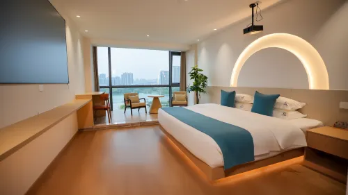 Xingyue Hotel (Baolong Plaza)