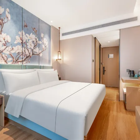 Magnotel Hotel (Taian Xintai Qingyun Shopping Center Jindou Road)