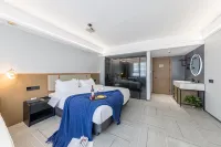 Wozhou Yueju Hotel (Xinchang Wanda Plaza)