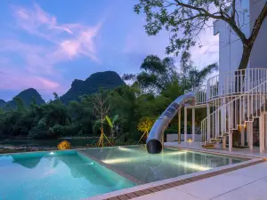 Mango Inn Mitang Family Resort Hotel (Yangshuo Shilihualang Yulong River Branch)