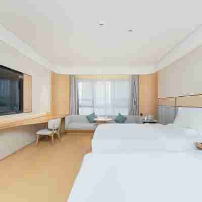 J hotel (Yizheng passenger station store) Rooms