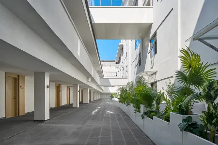 Jiulong Yipin Hotel (Zhenyuan Ancient City New Bridge) Отели рядом с достопримечательностью «Zhusheng Bridge»