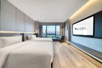 Temperature Season Hotel (Yiwu International Trade City Branch) Отели рядом с достопримечательностью «Чунг Цзинь Площадь»