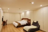 Xinghe Business Hotel