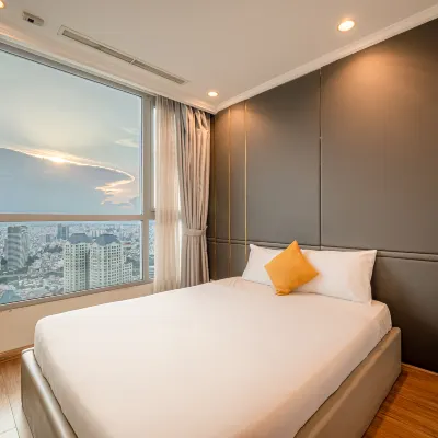 An Corner Apt - Vinhomes Central Park High Floor Nice View and Free Pick up for 5 Nights โรงแรมใกล้บินห์แทง