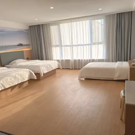 Fuli Manting Hotel (Qingdao Jiaodong International Airport) Отели в г. Цзяочжоу
