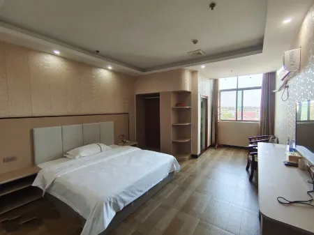 Xinganyutai Business Hotel Отели рядом с достопримечательностью «Zhu De Commander in Chief Mrs. Xiao Jufang Former Residence»