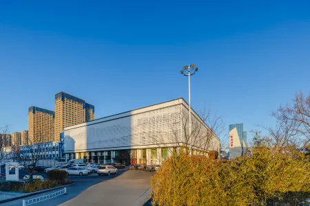 WEIHAI  REZEN SELECT HOTEL Отели рядом с достопримечательностью «Weihai Science and Technology Museum»
