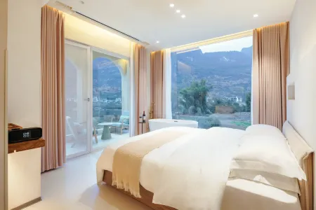 Yangshuo Qian'an Homestay (Yulong River Jiuxian Wharf Branch) Отели рядом с достопримечательностью «Yulong Bridge»