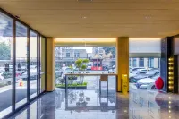 許昌棠悅美居飯店（胖東來時代廣場店） 許昌學院(東校區)-軟件職業技術學院附近的飯店