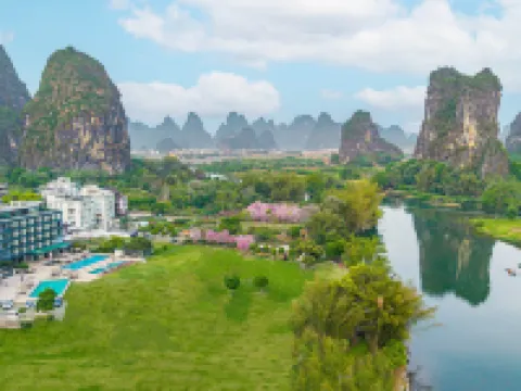 รีสอร์ทหยู่หยวน หยางซั่ว (แกลเลอรี่ซือหลี่ & แม่น้ำหยู่หลง) โรงแรมใกล้อูฐข้ามแม่น้ำ