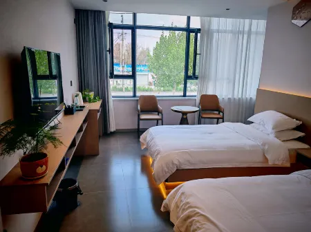 Huocheng Yunshang Huakai Homestay Отели в г. Хочен