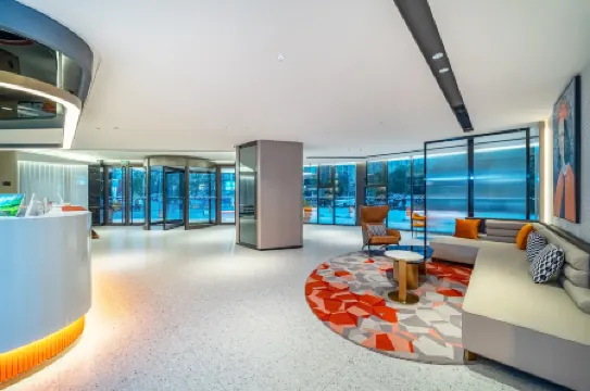 Guzhen Romantic Journey Hotel (Touzhi Building)