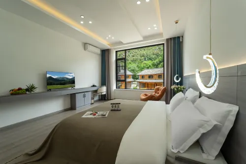 Listening to the wind · Courtyard Green Forest Rizhao Jinshan View Inn (Yulong Snow Mountain)