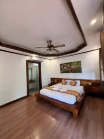 Queen's House Hoteles cerca de Wat Mai