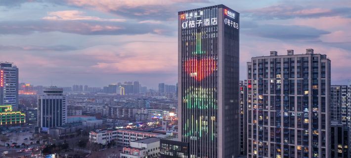Orange Hotel (Dezhou Department Store) Hotele w: Dezhou