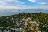 Xiamen Youshe Seaview Lodge (Huangcuo Beach, South Huandao Road) Отели в г. 