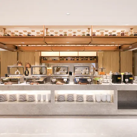 Magnolia Business Hotel (Changbai Mountain West Station Songjiang River Branch)