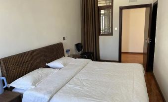 Yulong Baisha Alley Courtyard Inn