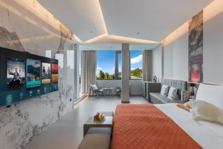 Yijingshanju Light Luxury Resort Hotel (Guling Scenic Area Liushanwang Park Branch) Отели рядом с достопримечательностью «The Gushan Spring Temple»