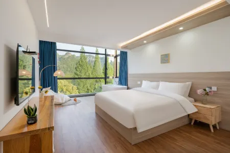 Xinchang Huaqianyueshang Homestay (Nineteen Peaks) Отели рядом с достопримечательностью «Qianzhang Canyon»