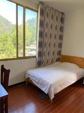 Tianquanke Daxia Youth Hostel Отели рядом с достопримечательностью «Erlang Mountain National Forest Park»