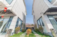 Xinmi Zhonglitaxun Homestay - Nouto- ja jättöpalvelut