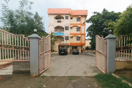 RedDoorz @ Tondaligan Beach Hotel Отели рядом с достопримечательностью «Pangasinan Baywalk»