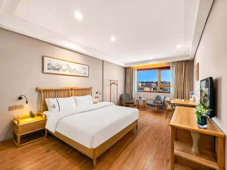 Man zhou Hotel Lilingmen Jinyang Branch Отели рядом с достопримечательностью «Zhuangyuanzhou Island»