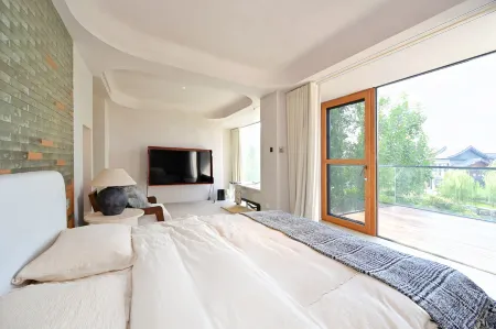 Songjian Wushe Homestay (Kaifeng Qingming Shanghe Garden Wansuishan Martial Arts City Branch) Отели рядом с достопримечательностью «Kaifeng Gulou Plaza»