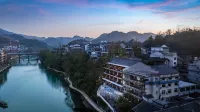Mengluo Xinghe Hotel Hôtels à : Xiushan County