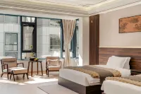 Songlan Qishe Hotel