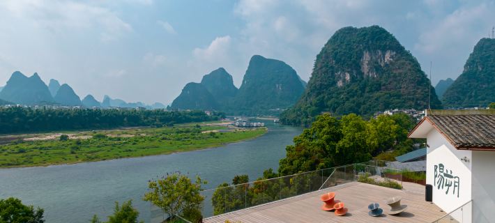 Yangshuo Percent Hotel  (West Street Li River  ) Отели в г. Яншуо