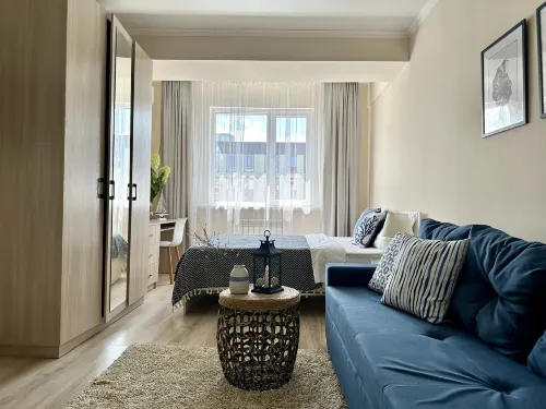 CANCUN apartment with big screen in the center of Almaty
