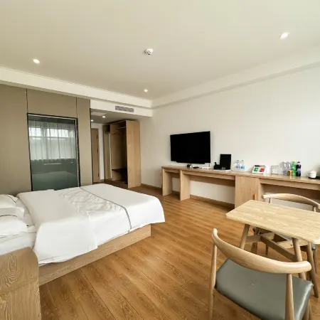 Jalaid Qijidi Business Hotel (Yindel Bus Station) Отели в г. Чжалайтэци