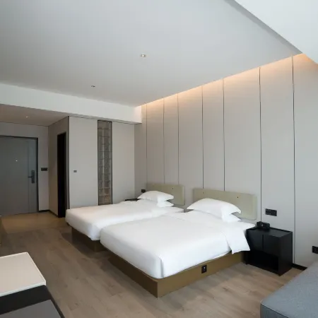 Yibin Meijing Hotel (Yibin Railway Area)