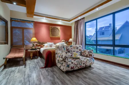 Hidden Garden Inn Отели рядом с достопримечательностью «Xishuangbanna Folk Custom Garden»