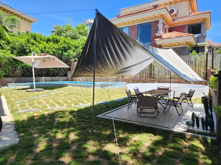 salted fish Apartment Отели рядом с достопримечательностью «Jinzijing Square»