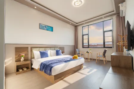 Lijiang Guangmang Wanzhang Homestay (Sanyi International Airport Branch) Отели рядом с Аэропорт Лицзян