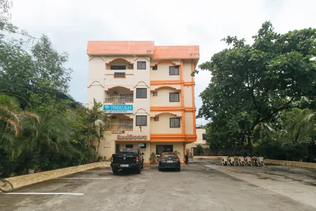 RedDoorz @ Tondaligan Beach Hotel Отели рядом с достопримечательностью «Pangasinan Baywalk»