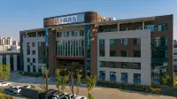 Junfu XiaoYinPuShe Hotel Отели рядом с достопримечательностью «Универмаг Wu»