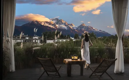 Yundu Scenic Beauty Inn (Yulong Baisha Branch) Отели рядом с достопримечательностью «Lijiang Snow Mountain Falcon Valley Scenic Area»