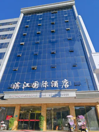 Tongcheng Riverside Hotel Отели в г. Тунчен