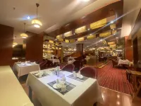 Iris Orchard All Suites Hotel (Tangshan Convention Center) - servizio colazione
