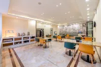 City Comfort Inn (Qujing Huizede City Store) - فطور