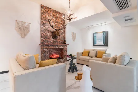 in the spring breeze Отели рядом с достопримечательностью «Xiangnan Botanical Garden»