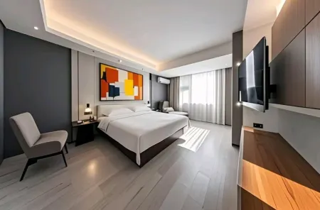 Chibi Lake Holiday Hotel (Xinjiekou Commercial Street) Отели в г. Чиби